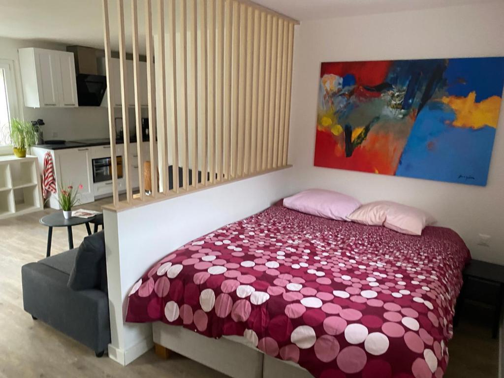 Postel nebo postele na pokoji v ubytování Spring Inn Apartments