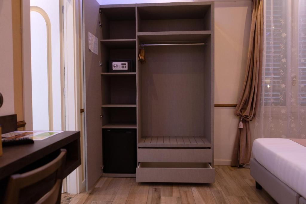 Postel nebo postele na pokoji v ubytování Antica Piacenza