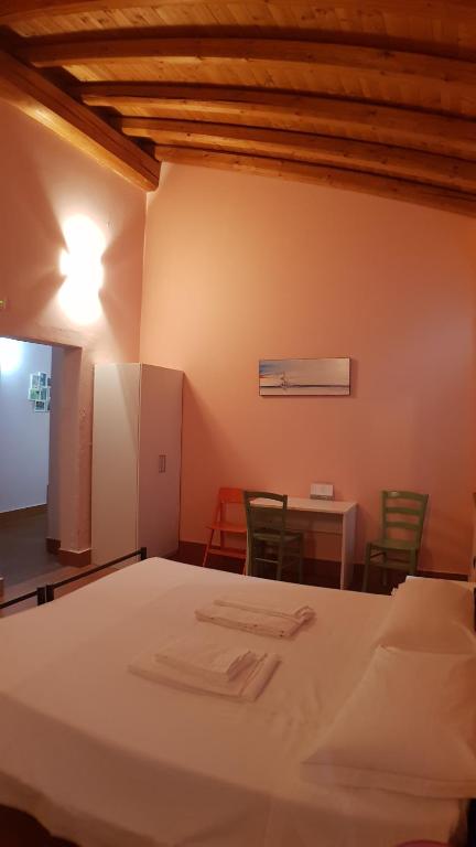 Postel nebo postele na pokoji v ubytování Ostello Molino Di Basso