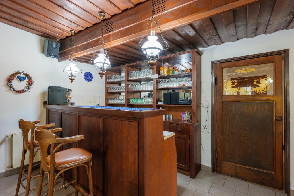 A kitchen or kitchenette at Penzion POSADA