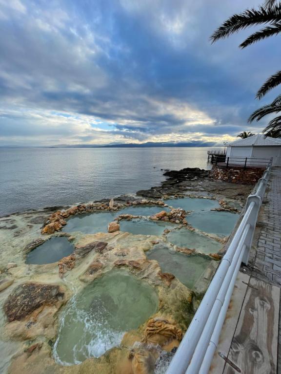 a view of the dead sea from the deck of a cruise ship at Cozy Flat Loutra Aidipsou in Loutra Edipsou