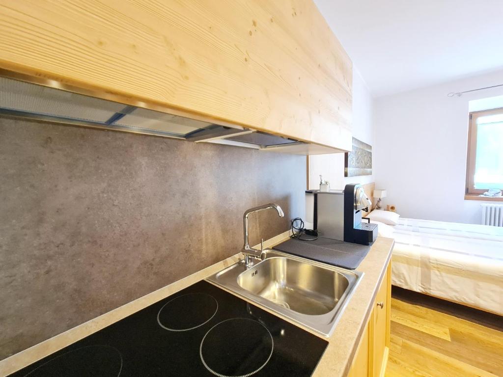 Kuchyň nebo kuchyňský kout v ubytování Pietra Rara Apartments