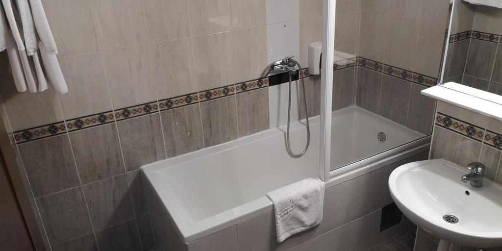 Koupelna v ubytování Hotel Elegance