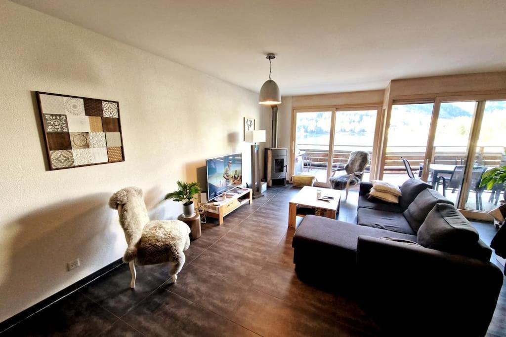 Posezení v ubytování Superbe appartement Champex-Lac avec piscine et sauna