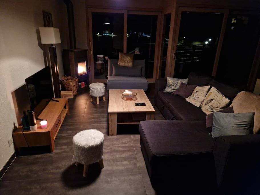 Posezení v ubytování Superbe appartement Champex-Lac avec piscine et sauna