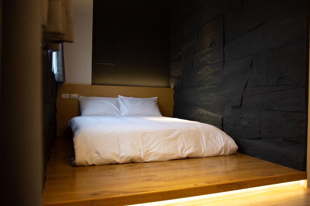 Postel nebo postele na pokoji v ubytování Traveler's Campfire B&B