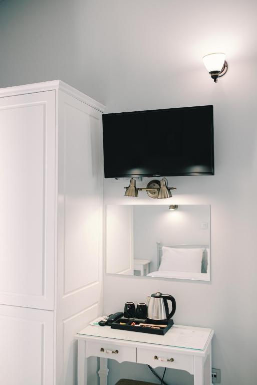 Kuchyň nebo kuchyňský kout v ubytování Neapolis 1897 Boutique Luxury Rooms