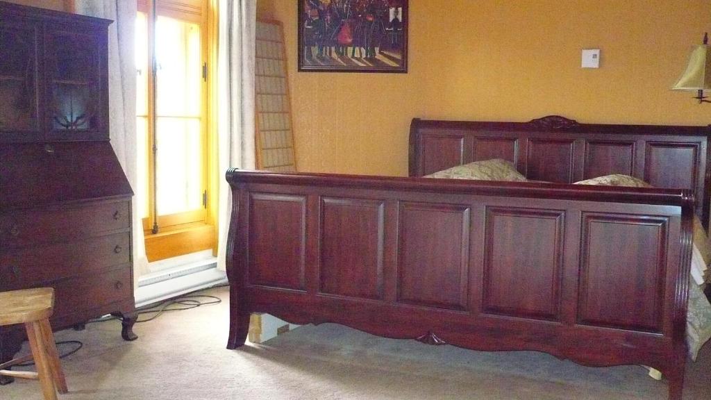 Una cama o camas en una habitación de L'intendant