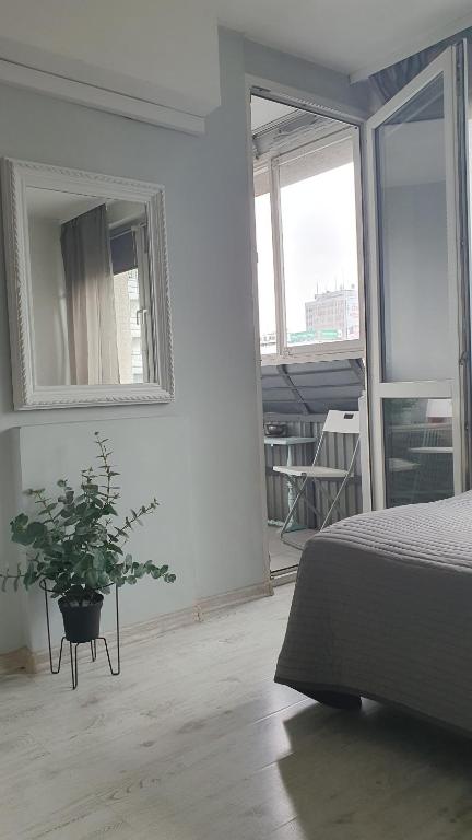 Posteľ alebo postele v izbe v ubytovaní Warszawa Centrum Apartament Daniella