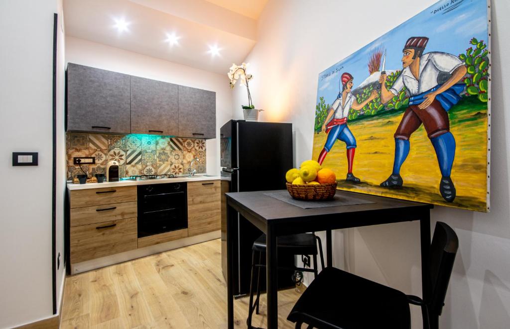 Kuchyň nebo kuchyňský kout v ubytování Casa Leonida