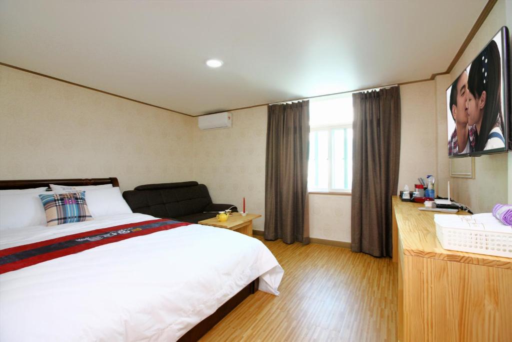 Postel nebo postele na pokoji v ubytování Traum Hotel & Condo