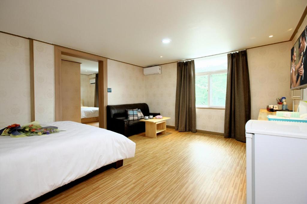 Postel nebo postele na pokoji v ubytování Traum Hotel & Condo