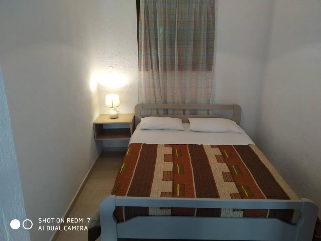 Postel nebo postele na pokoji v ubytování Bay View Apts II