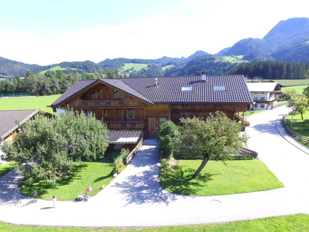 an overhead view of a large wooden house with trees at Exquisite Apartment in Reith im Alpbachtal near Ski Resort and Lake in Reith im Alpbachtal