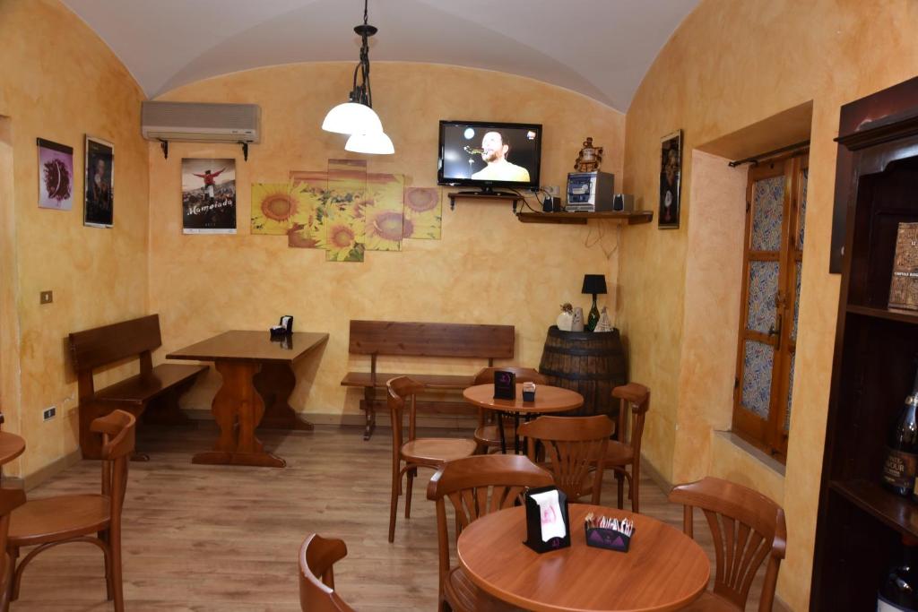 TV a/nebo společenská místnost v ubytování B&B LE DUE ISOLE