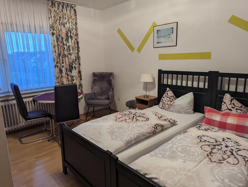 Postel nebo postele na pokoji v ubytování Hotel Heideklause