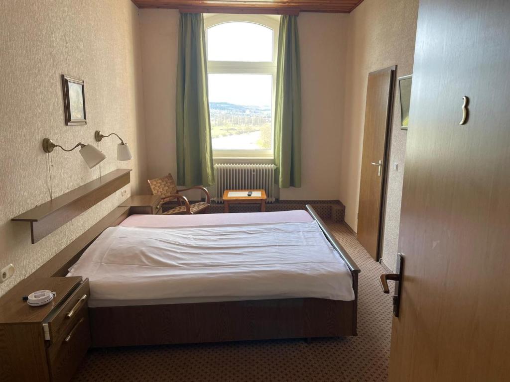 Postel nebo postele na pokoji v ubytování Waldhotel Steinkrug