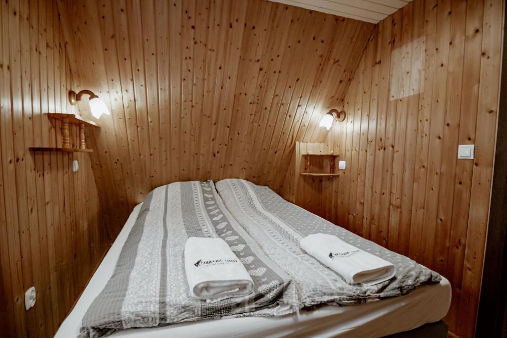 Postel nebo postele na pokoji v ubytování Sudecki Domek