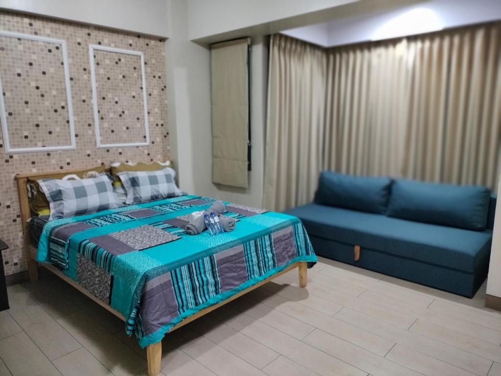 RQUI CONDOTEL NEAR AIRPORT AT TWO PALMTREE VILLAS