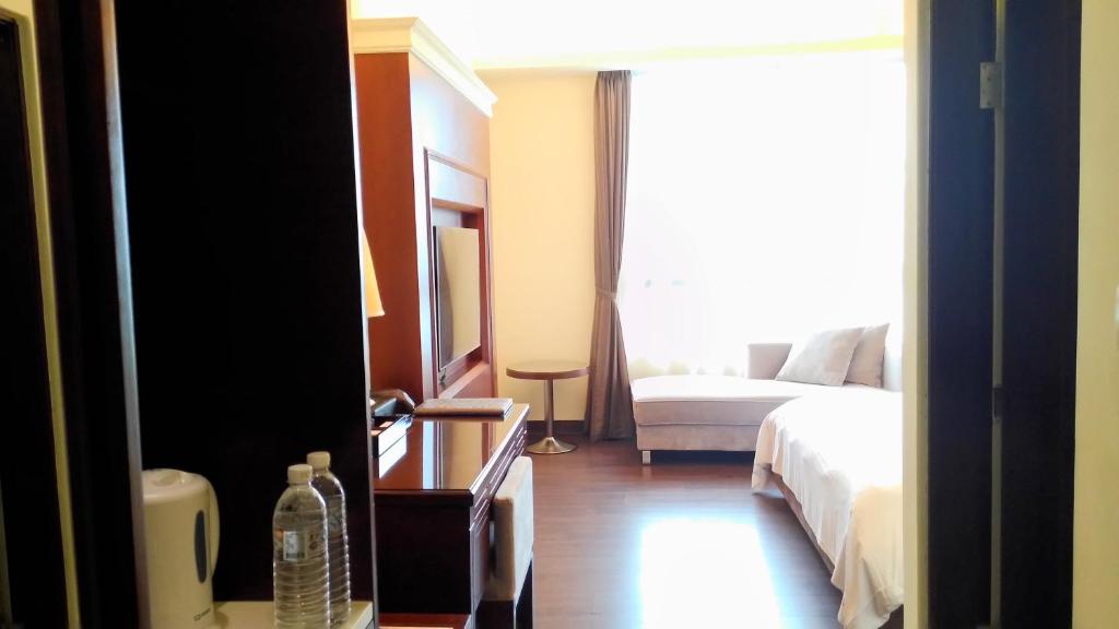 Postel nebo postele na pokoji v ubytování Hotel Modern Puli