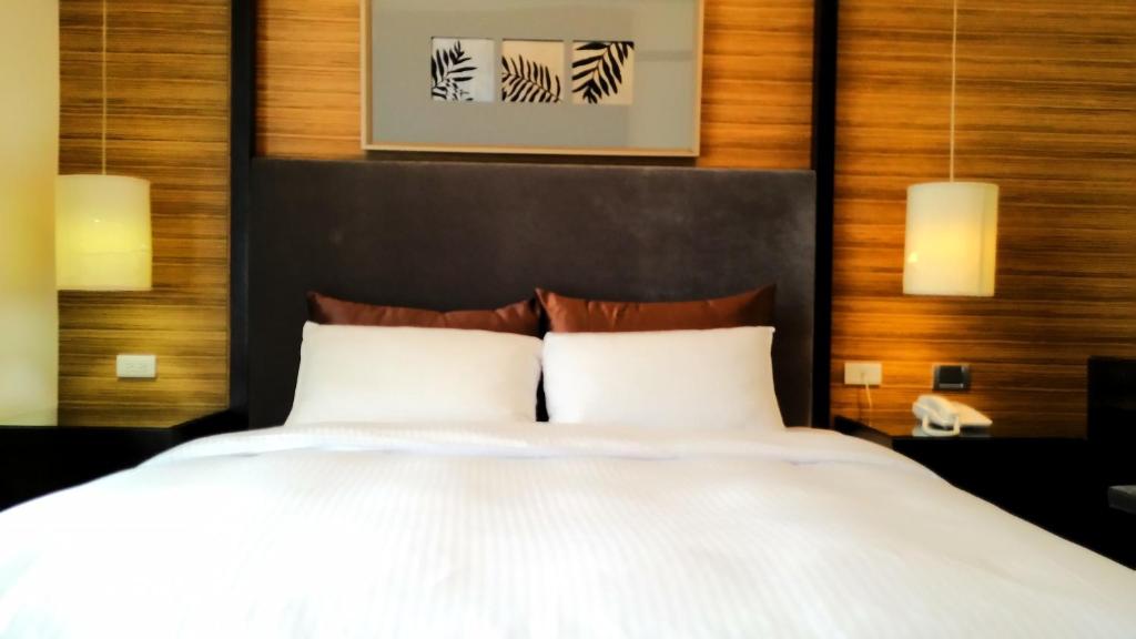Postel nebo postele na pokoji v ubytování Hotel Modern Puli