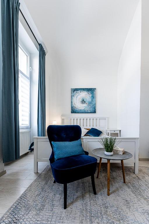 A seating area at Center Apartment Mlynska Kosice with private Parking