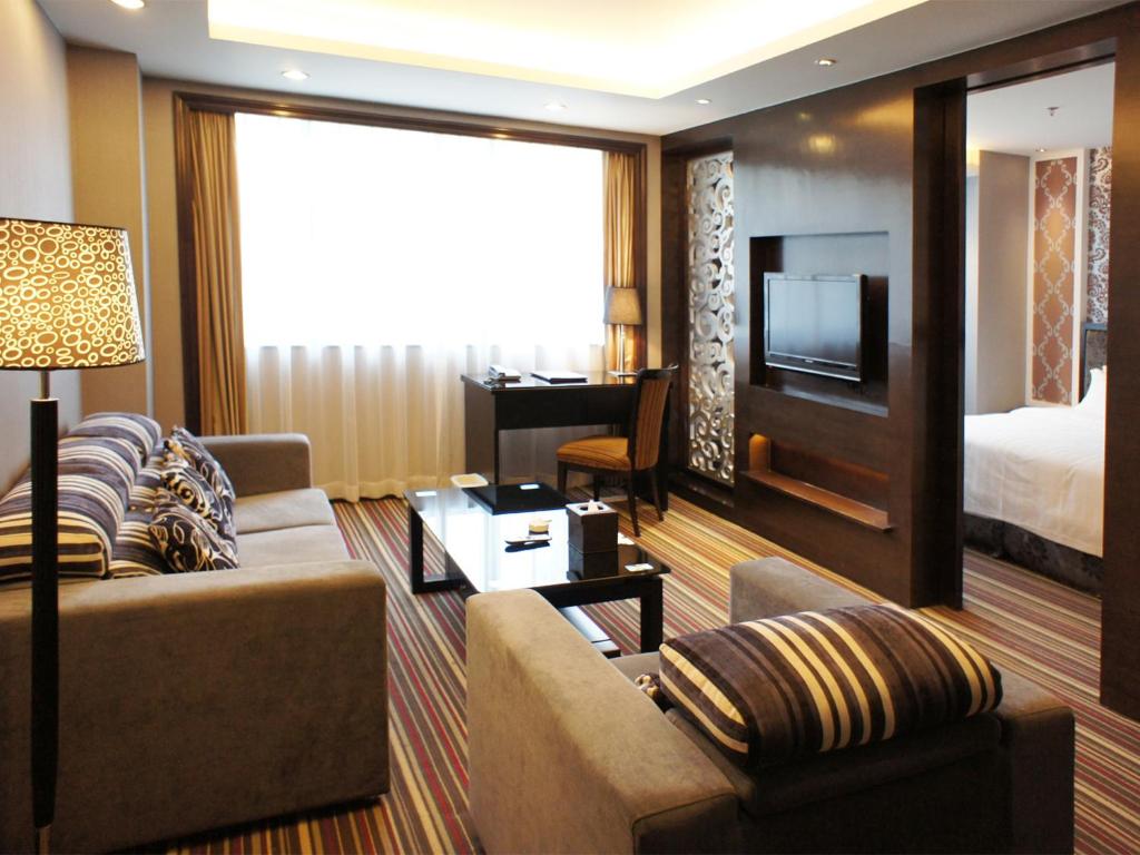 TV a/nebo společenská místnost v ubytování Shenzhen Lido Hotel