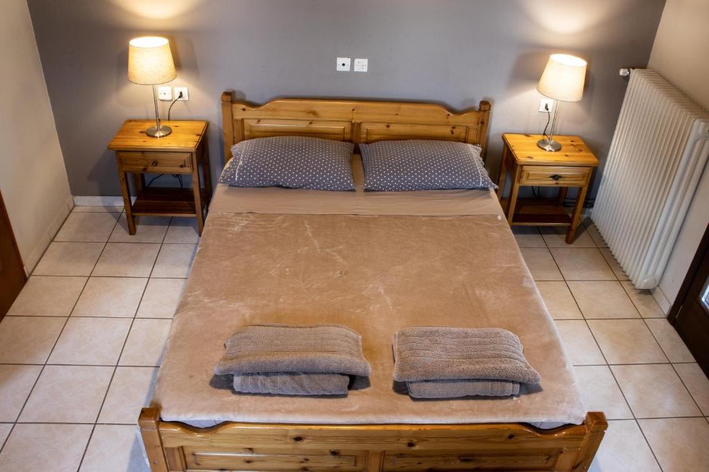 Postel nebo postele na pokoji v ubytování Hotel Defkalion