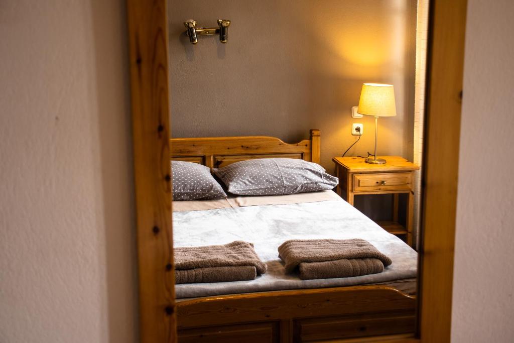 Postel nebo postele na pokoji v ubytování Hotel Defkalion