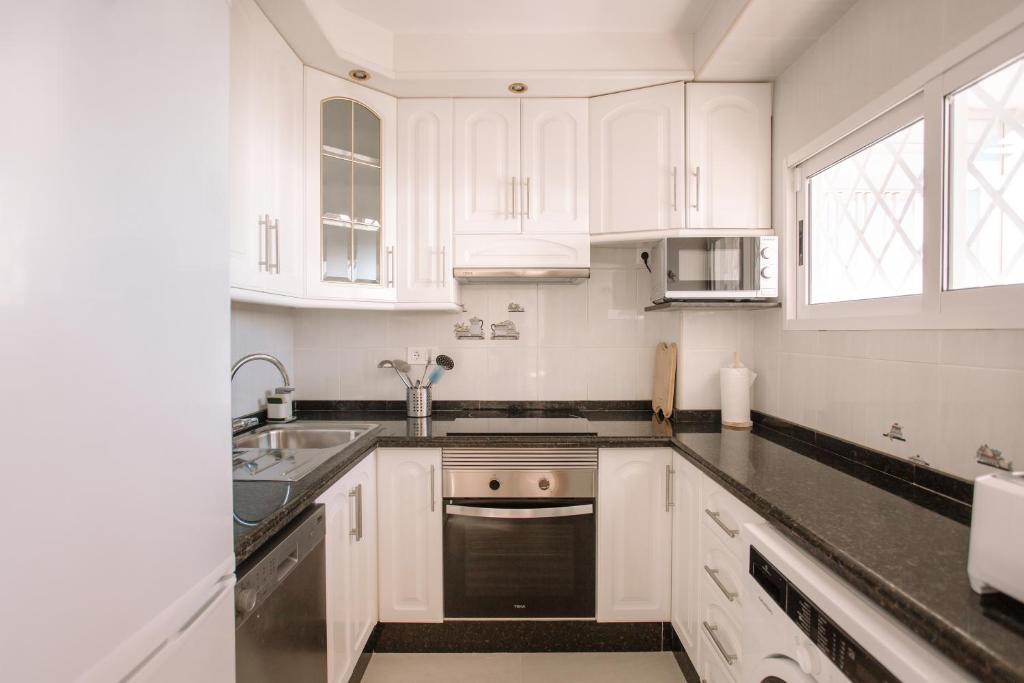 Kuchyň nebo kuchyňský kout v ubytování Bonefish 2 Apartment