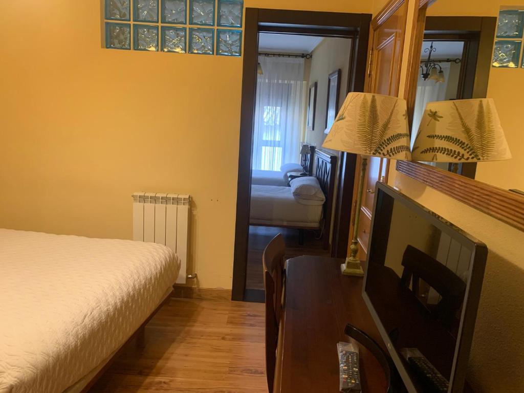 Postel nebo postele na pokoji v ubytování DC Mesones 21
