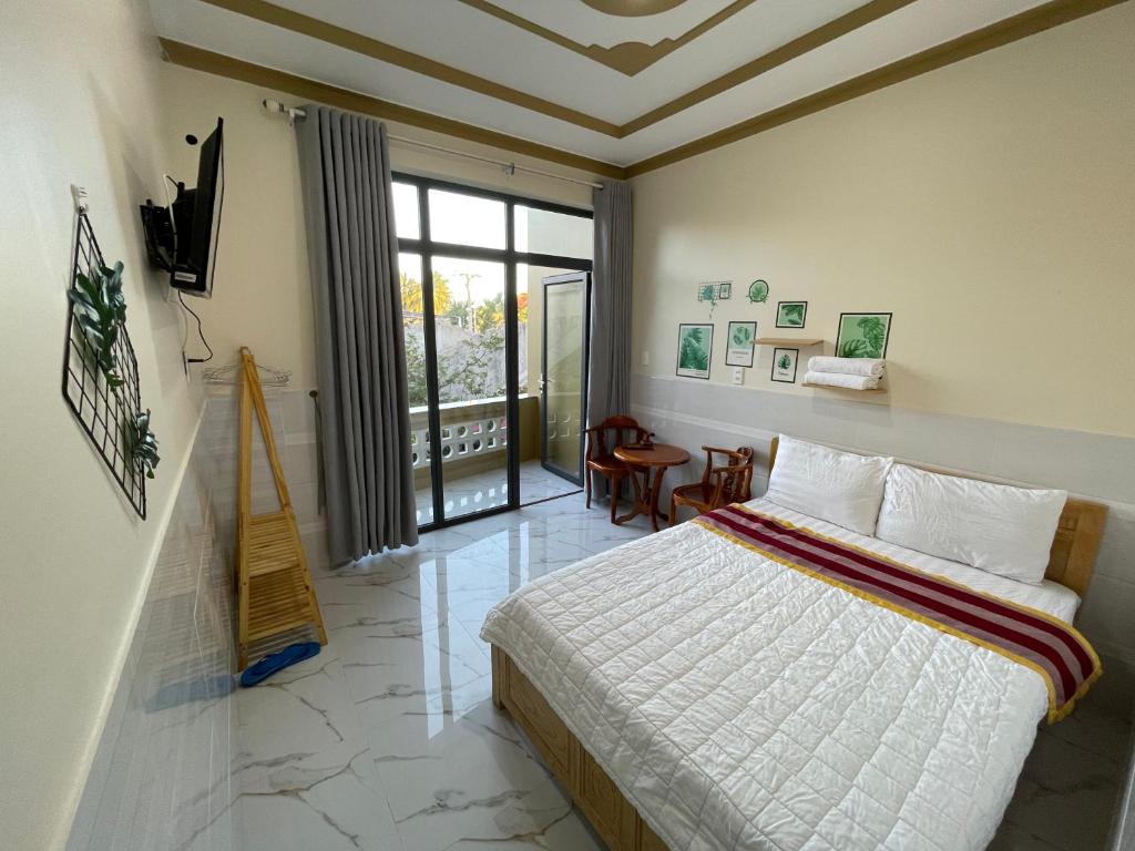 Giường trong phòng chung tại T'H Homestay