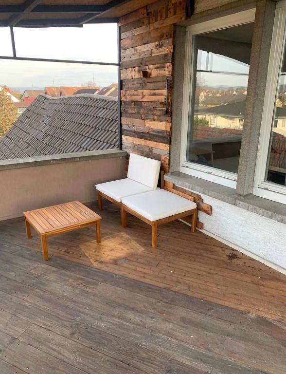 Balkón nebo terasa v ubytování Mainpark Apartment 4 Schlafzimmer bis zu 10 Personen direkt über AschaffApartment bei Aschaffenburg