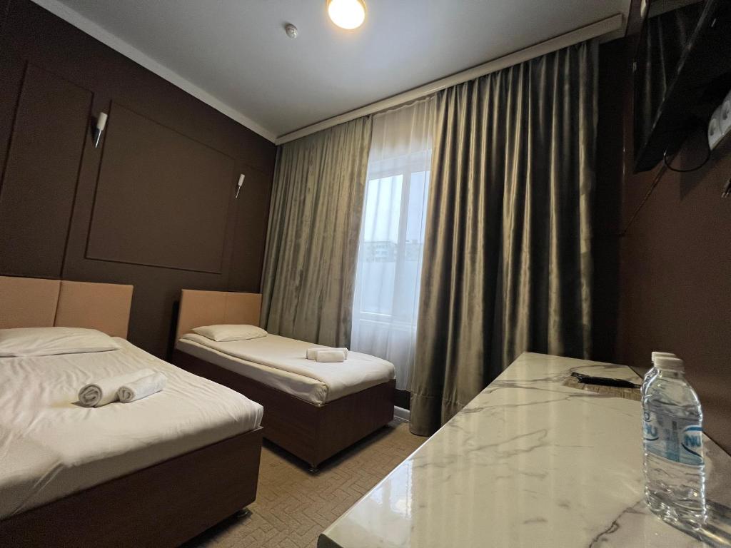 Hotel NOMAD - Habitación Gemela Estándar