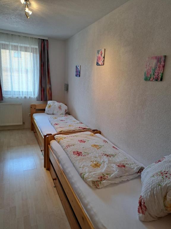 Postel nebo postele na pokoji v ubytování Appartement Haus Gatterer