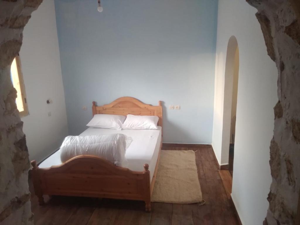 Postel nebo postele na pokoji v ubytování Hotel Magdoul