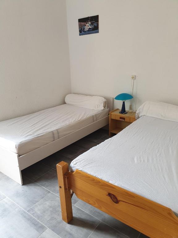 Posteľ alebo postele v izbe v ubytovaní CORALLINES Agréable petite villa 2 pièces mezzanine Mt St Martin Cap d'Agde