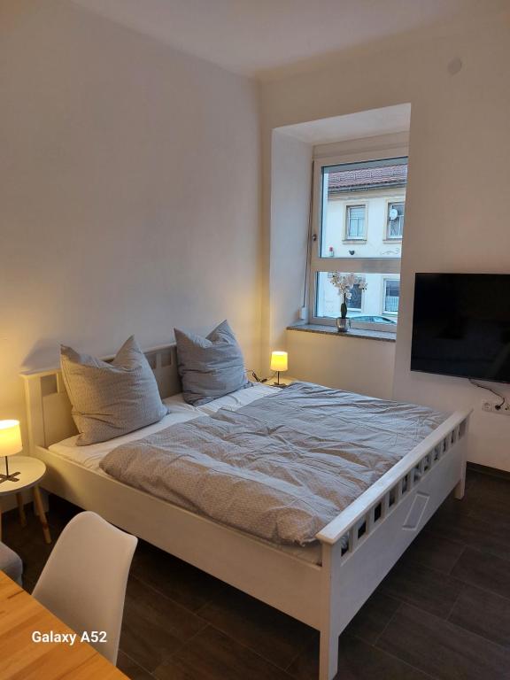Postel nebo postele na pokoji v ubytování Apartments im Mardefeldpalais