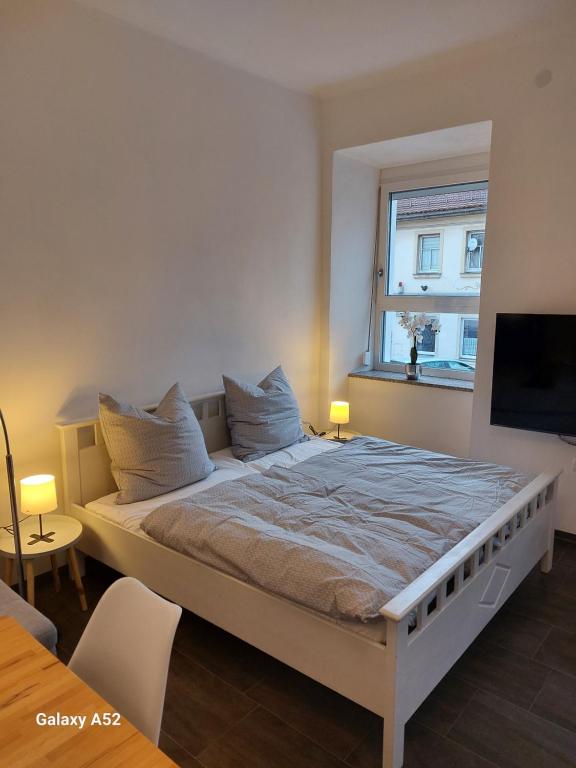 Postel nebo postele na pokoji v ubytování Apartments im Mardefeldpalais