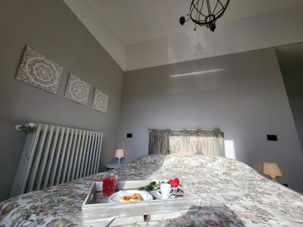 Łóżko lub łóżka w pokoju w obiekcie Palazzetto del Pittore