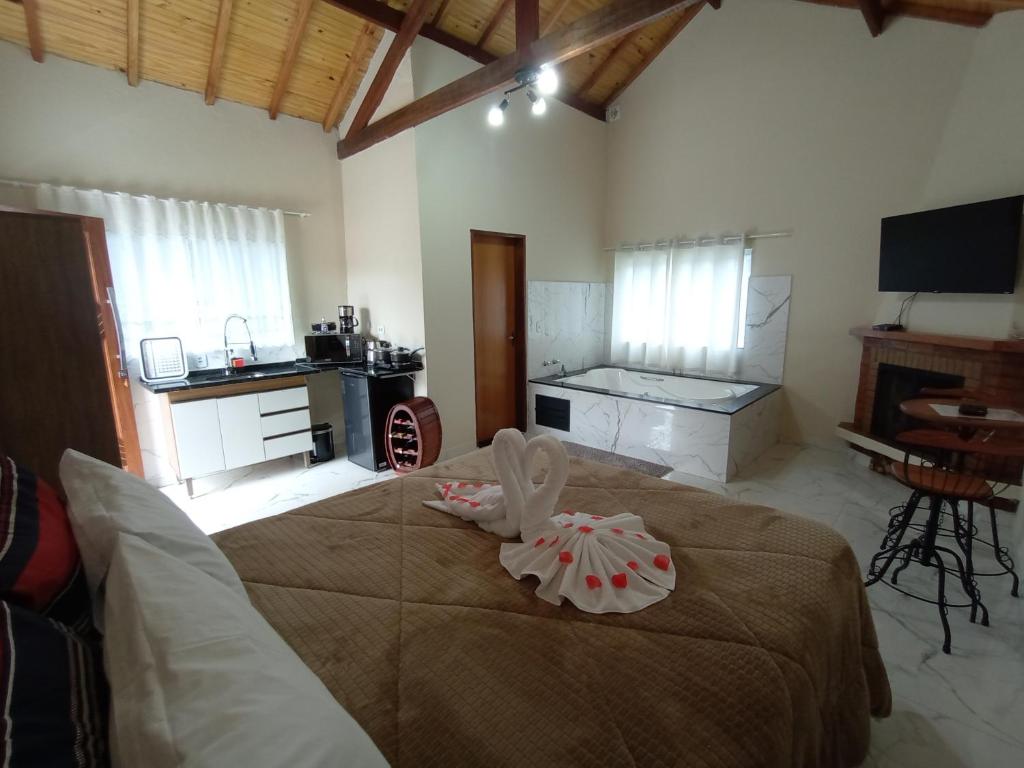 TV a/nebo společenská místnost v ubytování Cantinho na serra