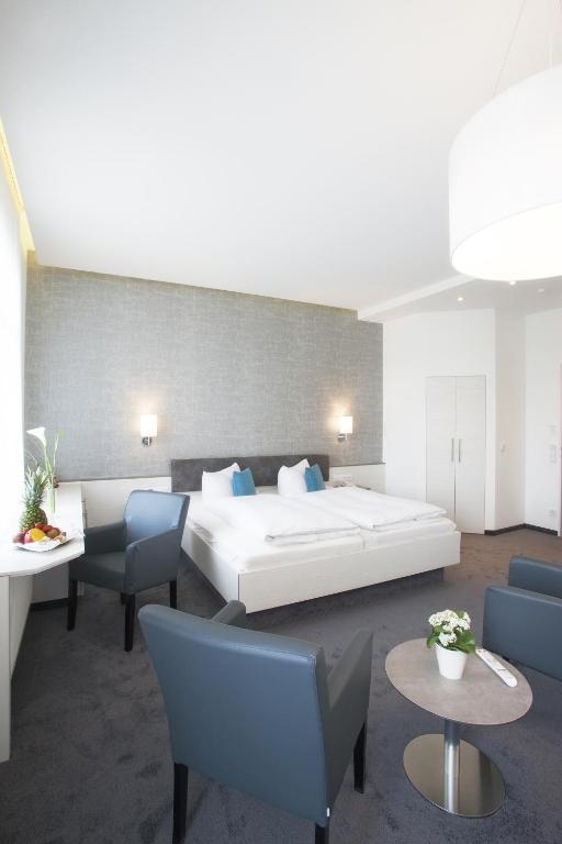 Postel nebo postele na pokoji v ubytování Ebner - Boutique-Hotel & Konditorei