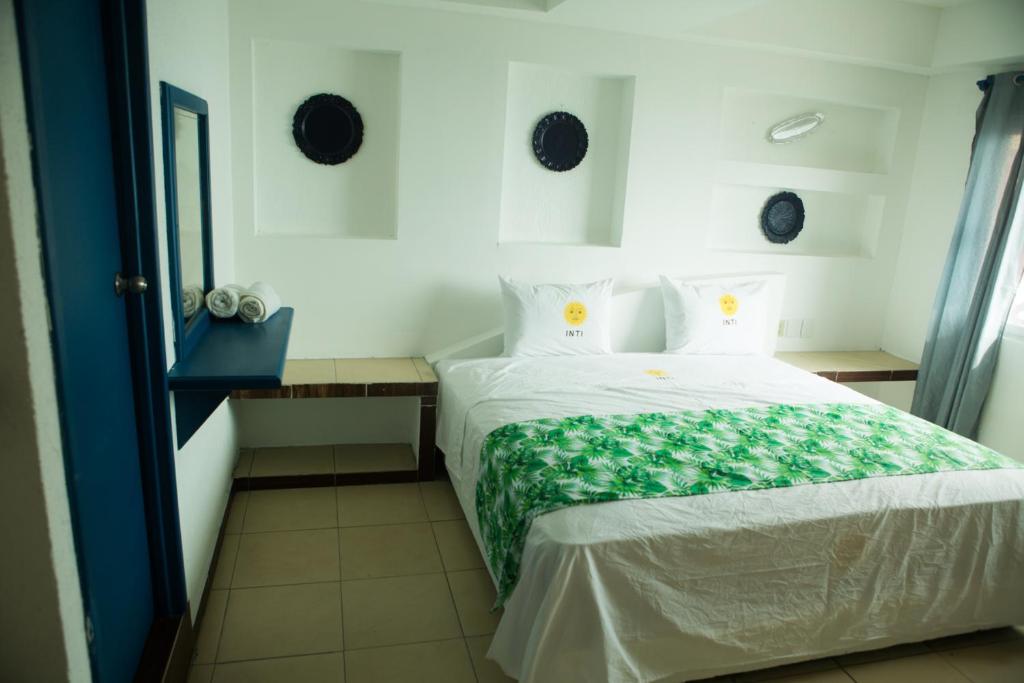Postel nebo postele na pokoji v ubytování HOTEL INTI