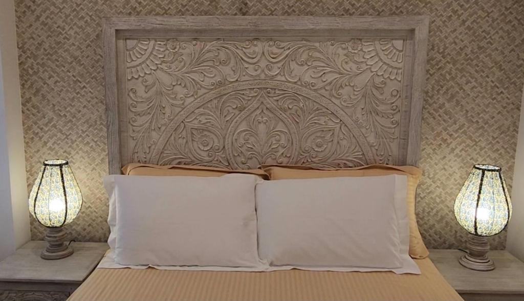 Postel nebo postele na pokoji v ubytování Knightsbridge Grand Apartment