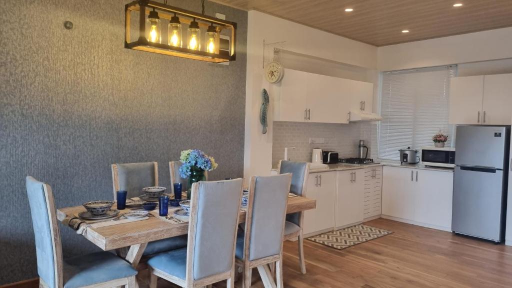 Kuchyň nebo kuchyňský kout v ubytování Knightsbridge Grand Apartment