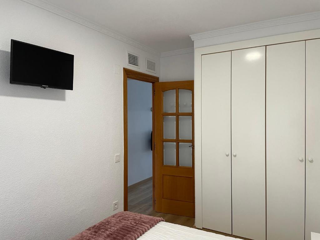 TV a/nebo společenská místnost v ubytování Bonefish 2 Apartment