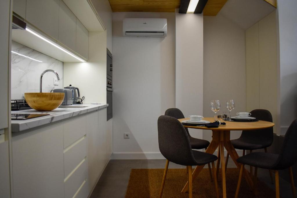 Kuchyň nebo kuchyňský kout v ubytování Apostolos Loft