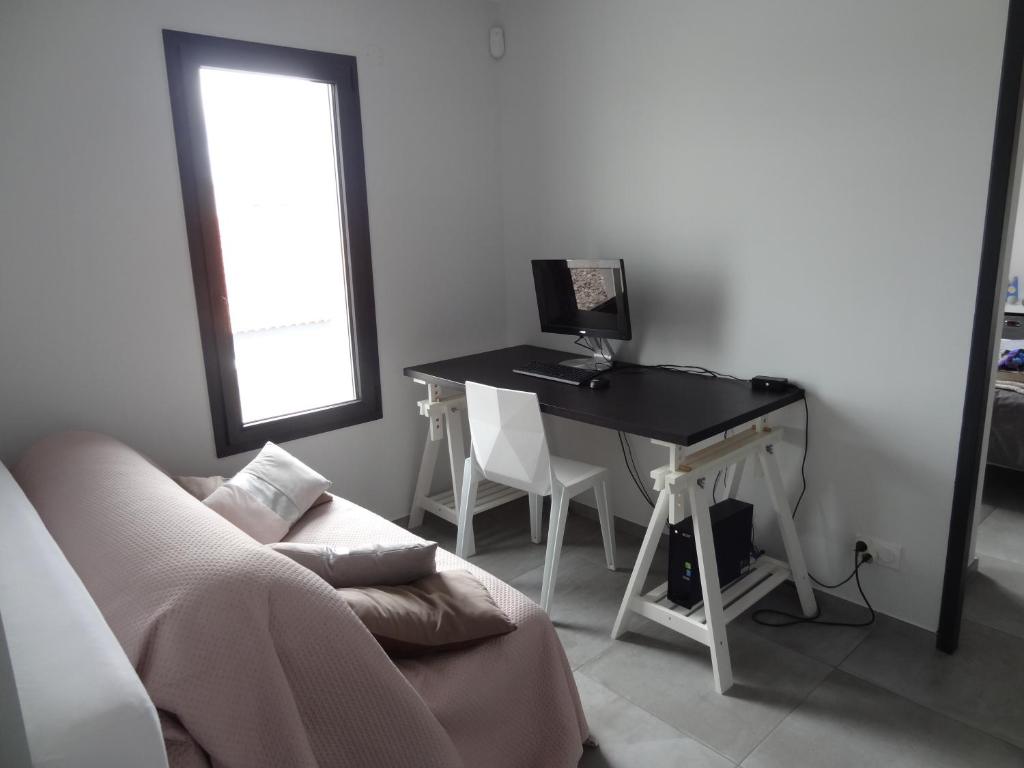 Televízia a/alebo spoločenská miestnosť v ubytovaní Villa moderne dans quartier calme