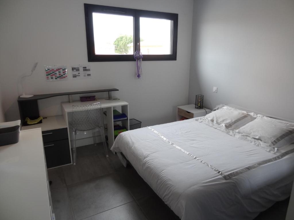 Posteľ alebo postele v izbe v ubytovaní Villa moderne dans quartier calme