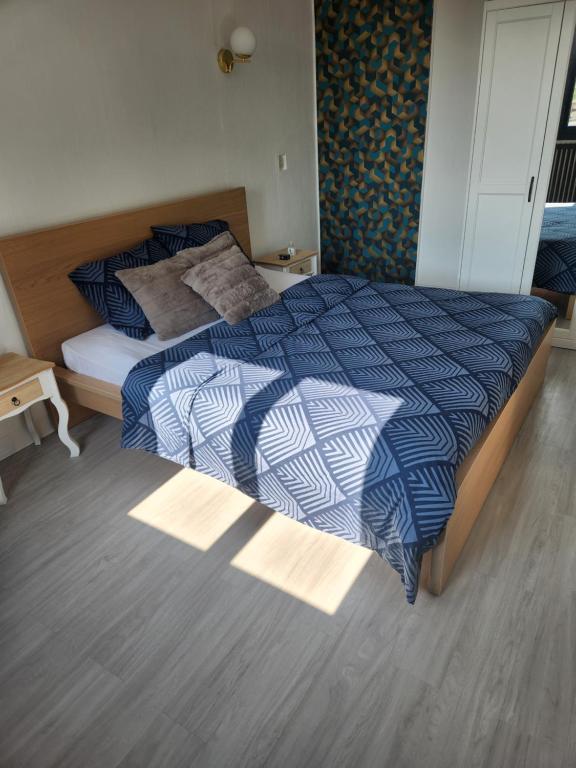Postel nebo postele na pokoji v ubytování LOCATION T2